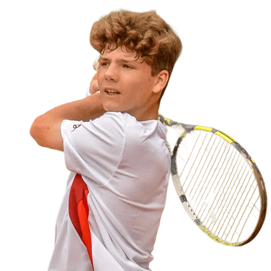 Young tennis player preparing to hit a backhand shot