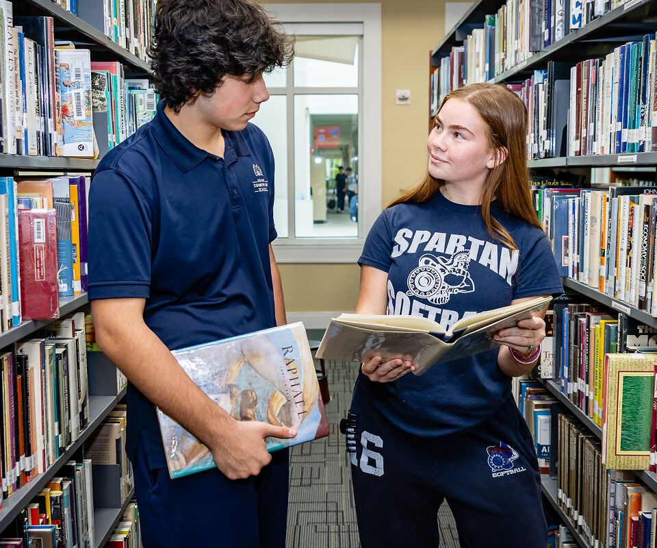 MCDS students reading together in the library