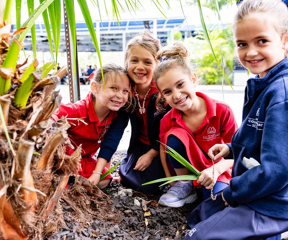 Early Childhood students playing together outdoors