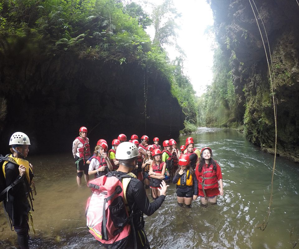 MCDS students exploring a river during a GLOBE international exchange trip