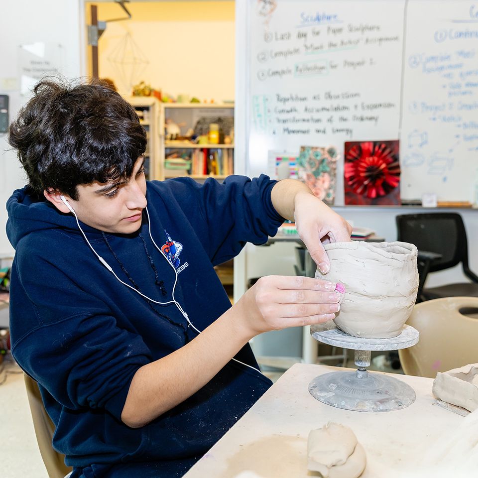 MCDS Visual Arts student working on a sculpture