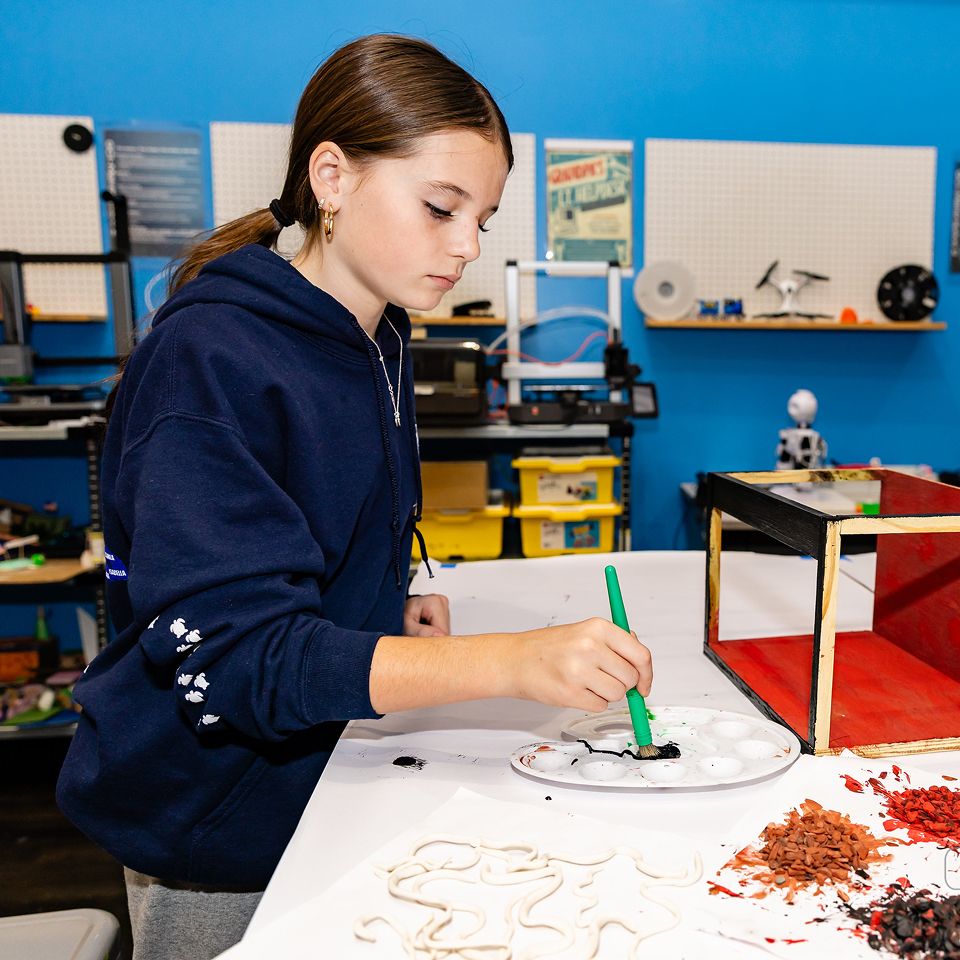 MCDS visual arts student working on an art project