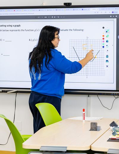 MCDS Upper School teacher leading a classroom lesson