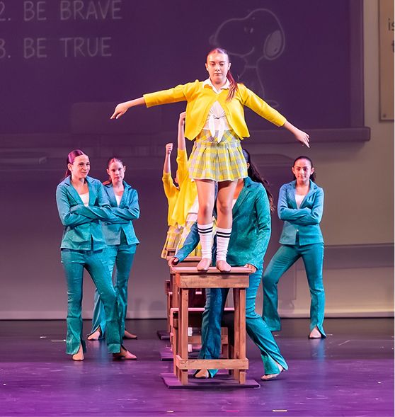 MCDS Dance students performing an ensemble piece