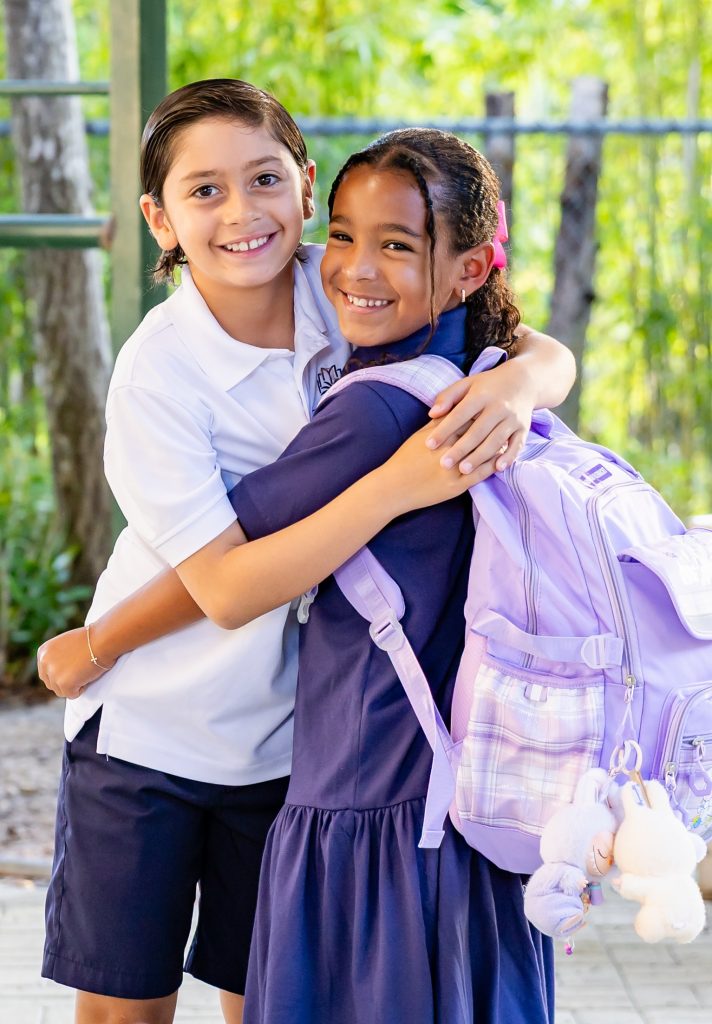 MCDS students hugging on the first day of school