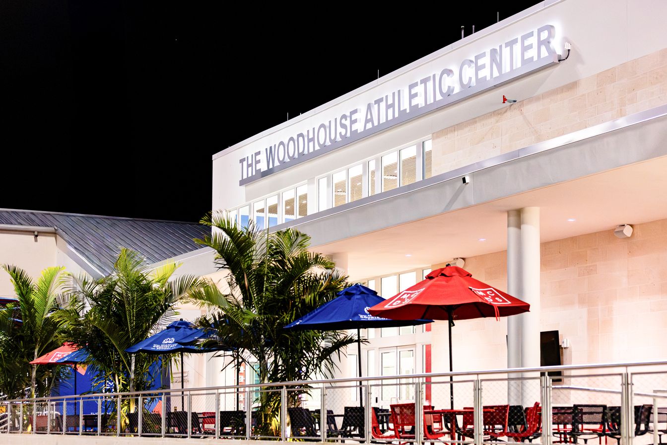 Woodhouse Athletic Center exterior lit at night
