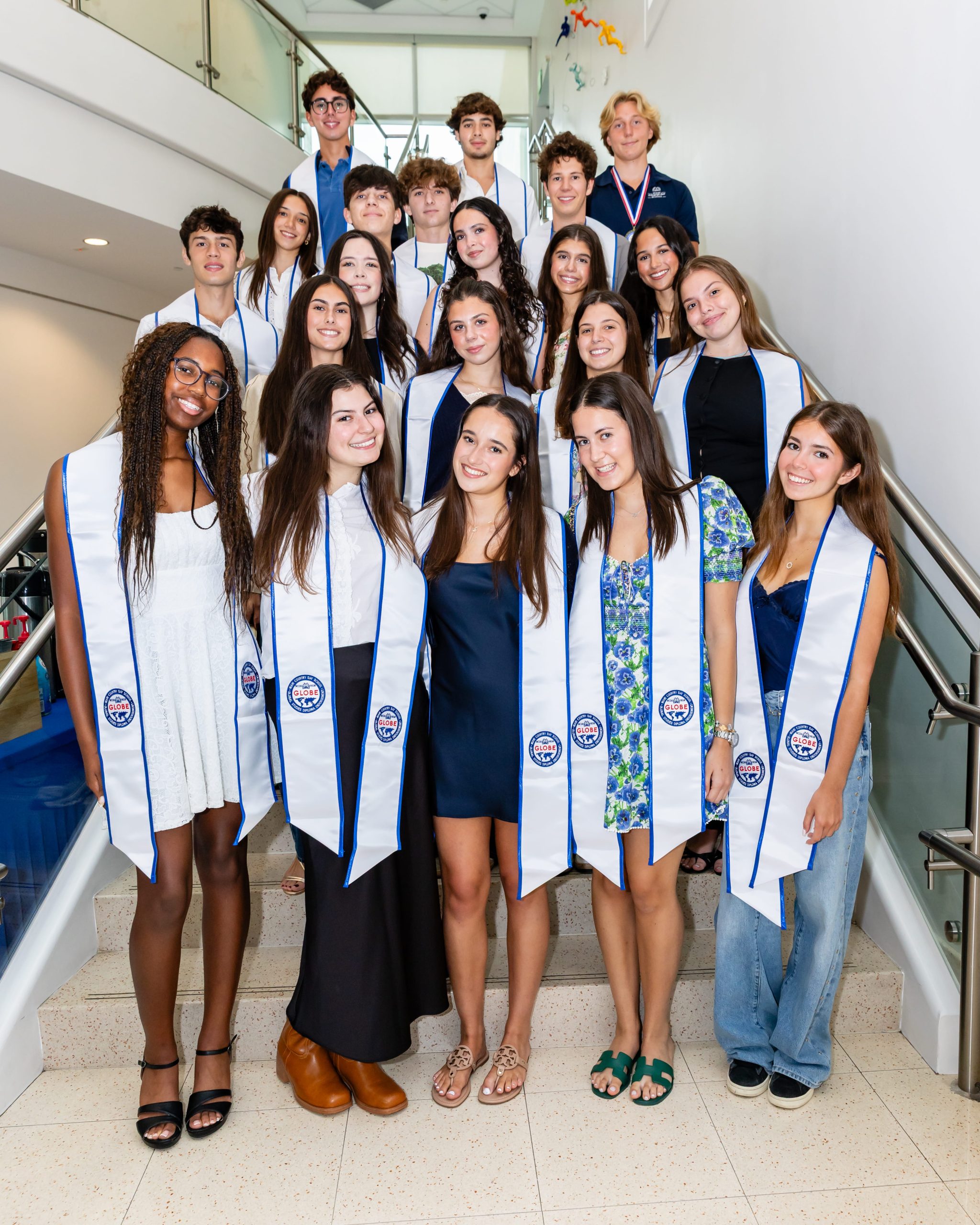 MCDS students posing together at the Global Studies Diploma Endorsement ceremony