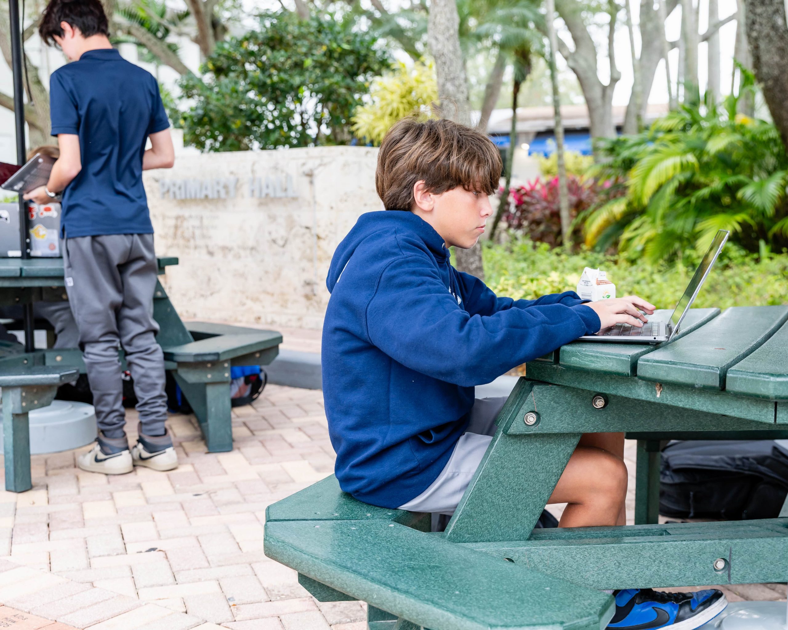 MCDS student working outdoors, shown on the Auxiliary Programs page