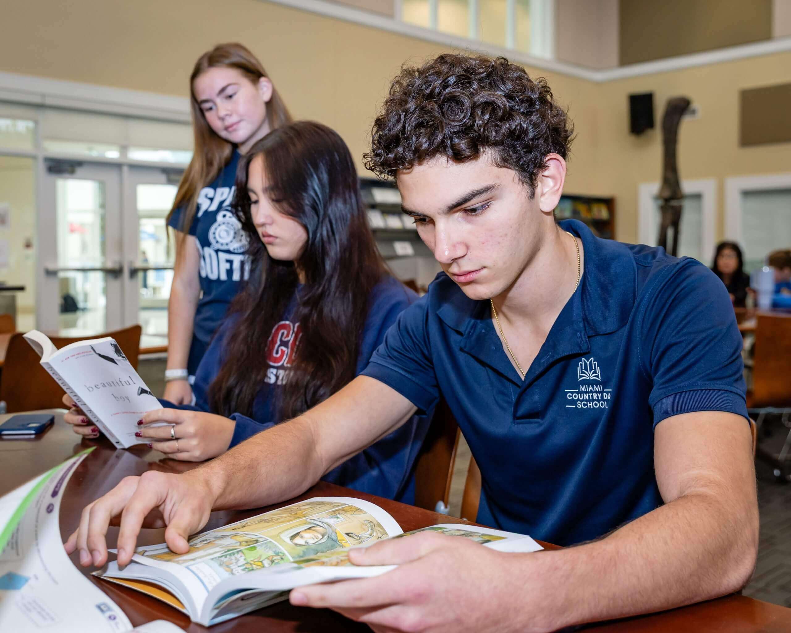 MCDS Upper School student working on an art project in the classroom