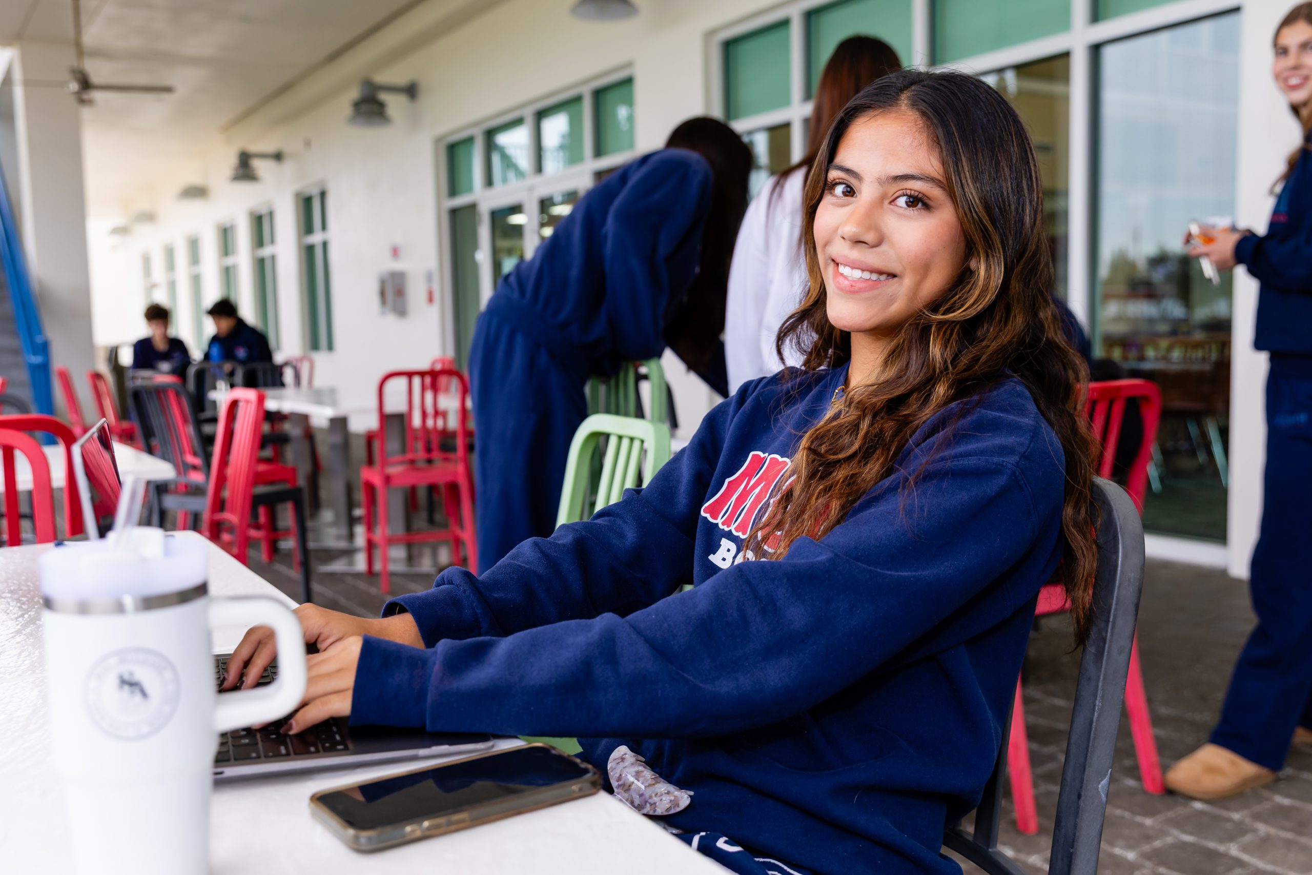 MCDS Upper School student at table