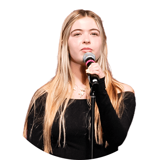 MCDS Upper School student singing at the Spring Music Concert