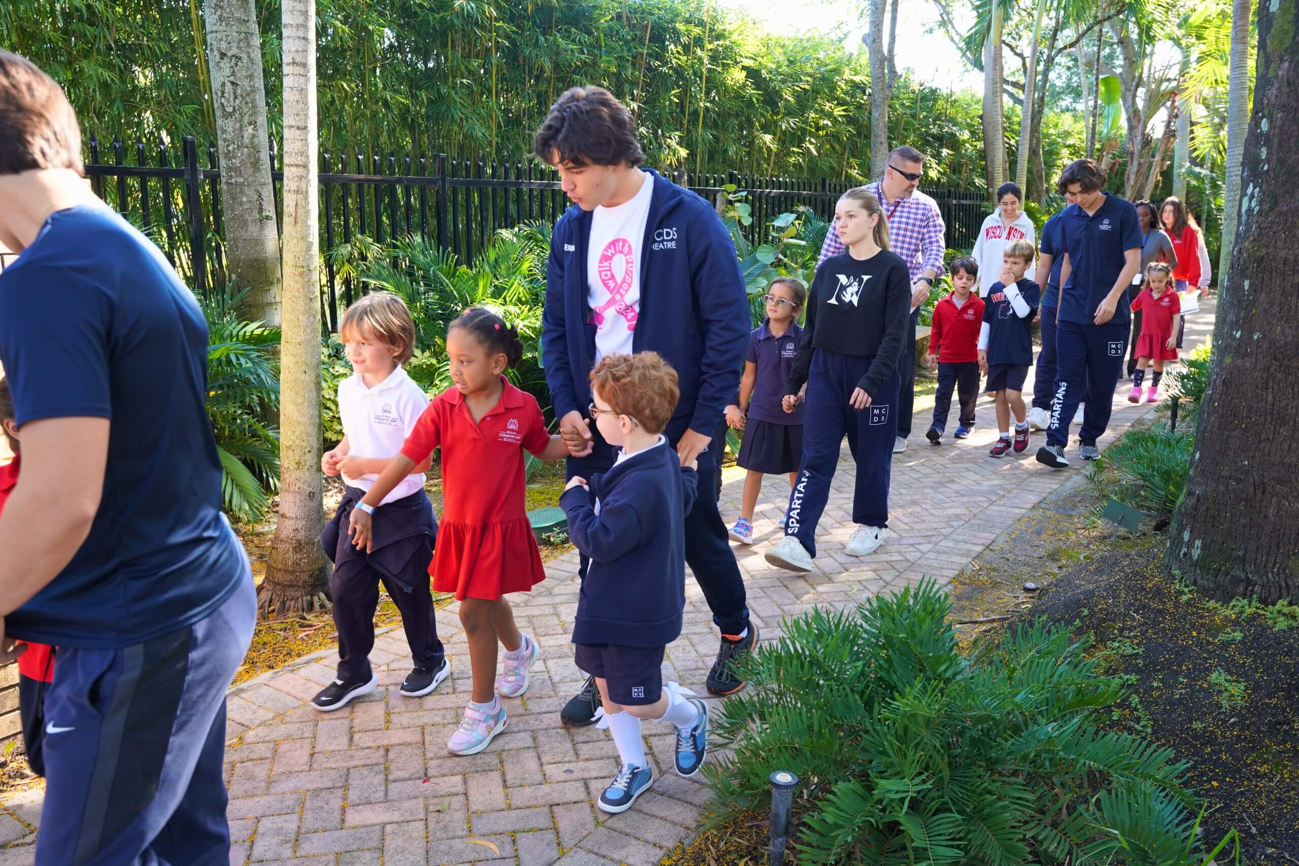 MCDS families walking on campus, shown on the Our Strategic Plan and Why MCDS pages