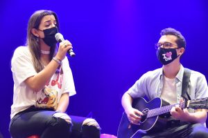 MCDS Upper School students performing music together on stage