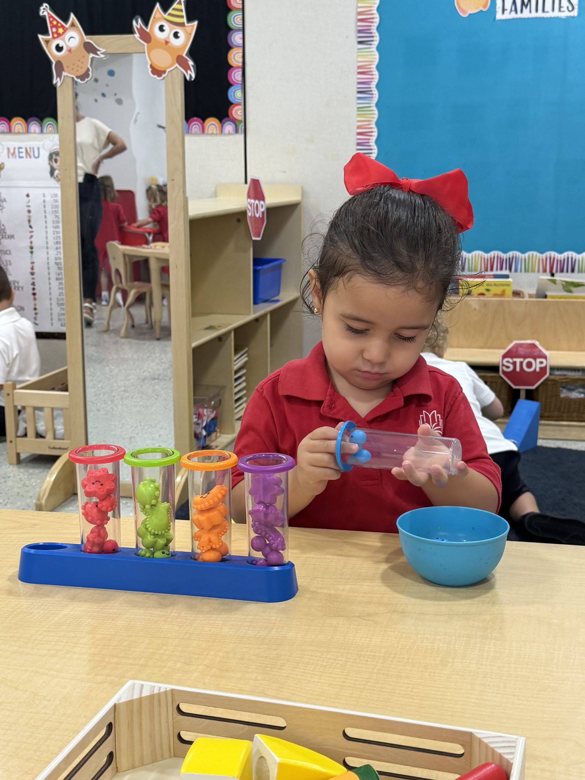Early Childhood students engaged in a math lesson