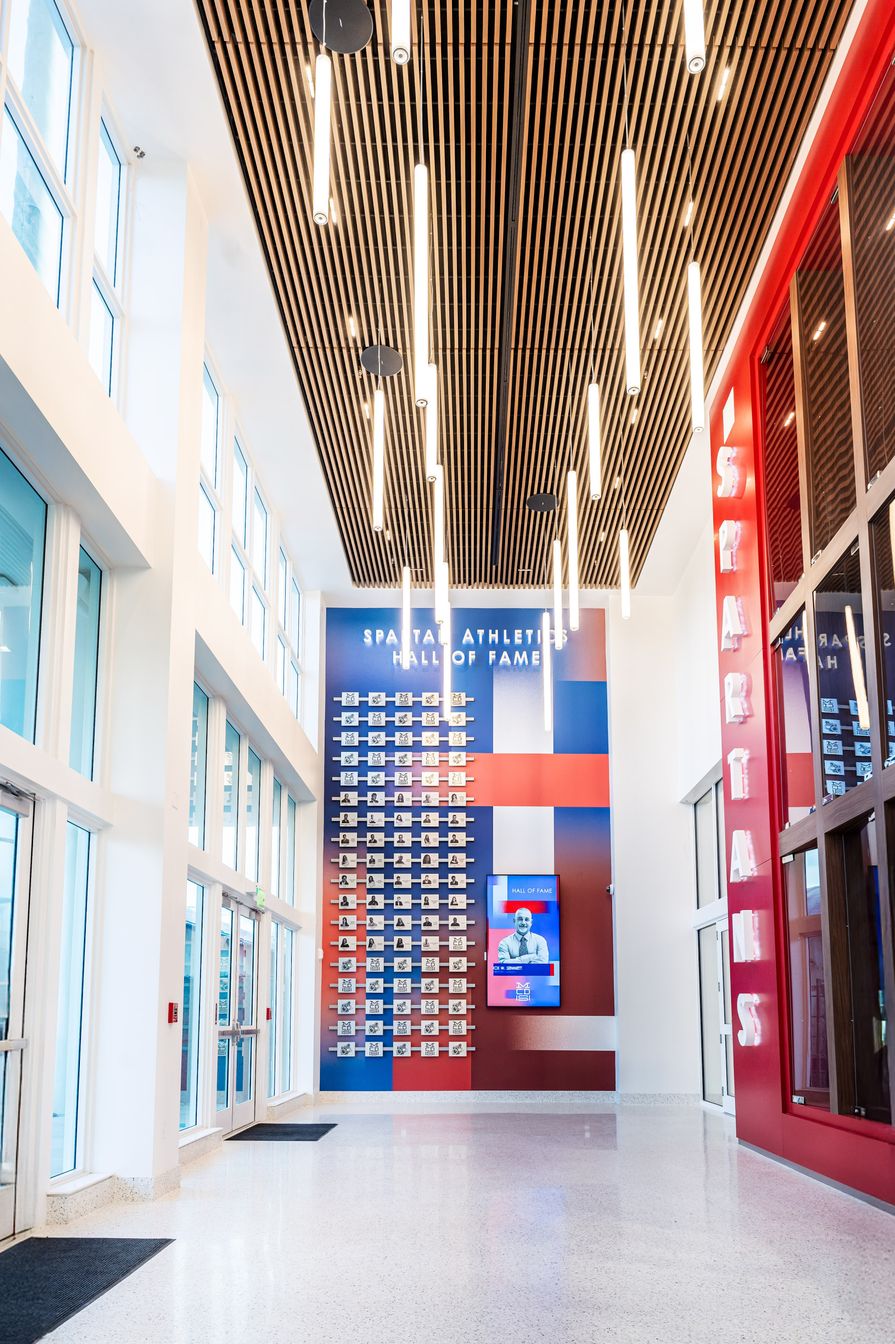 MCDS athletic facility hallway featuring Spartan branding
