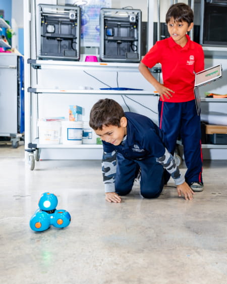 Lower School students engaged in a science and innovation activity