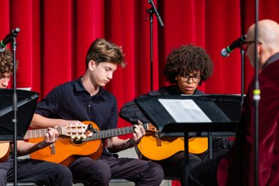 Middle School guitar ensemble performing