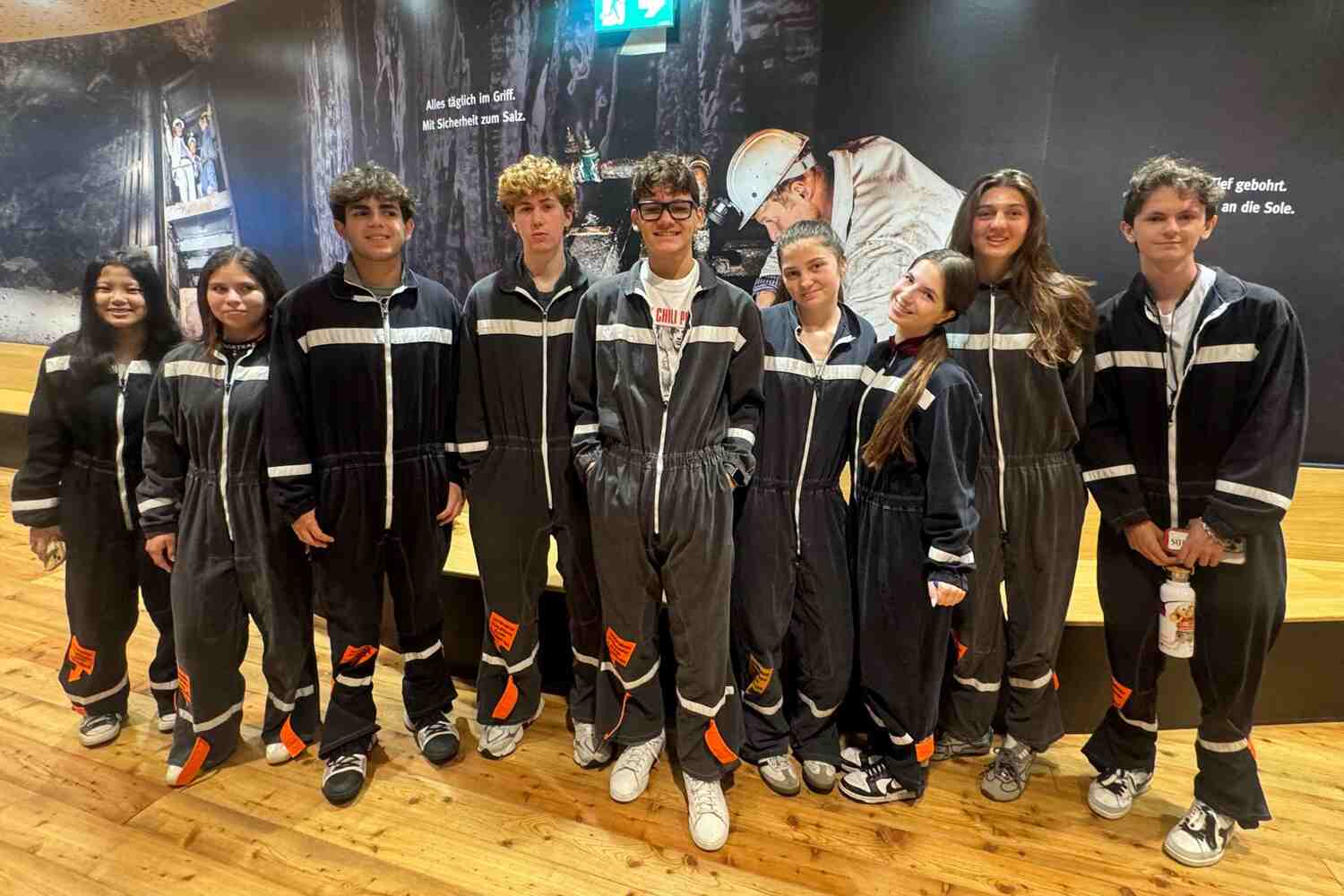 Upper School students lined up in matching team tracksuits