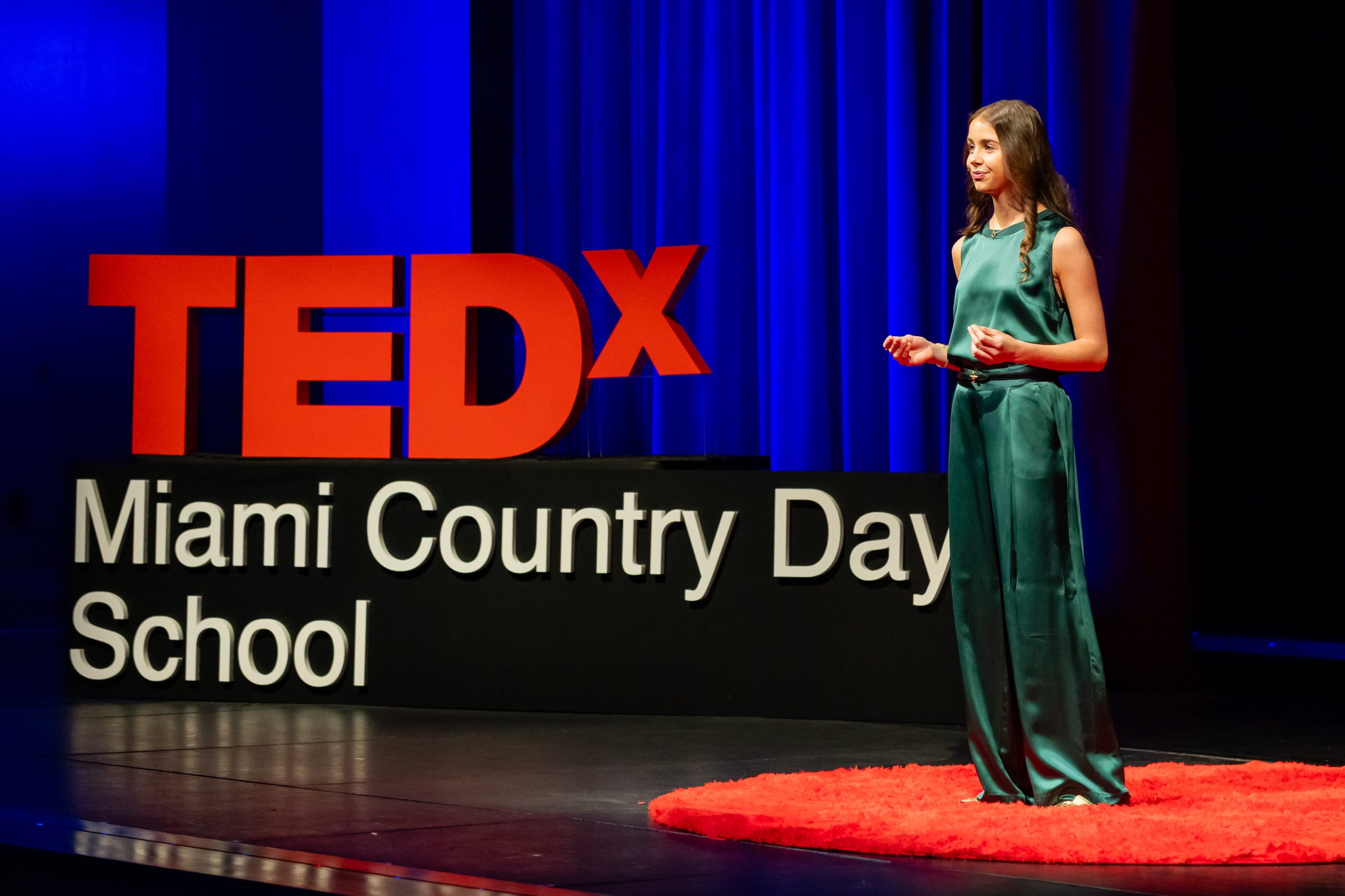 TEDx Miami Country Day School event photo, shown on the Giving page