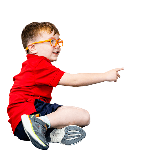 MCDS Early Childhood student jumping playfully