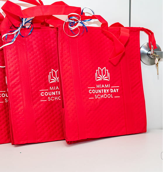 MCDS branded gift bags for alumni and community events