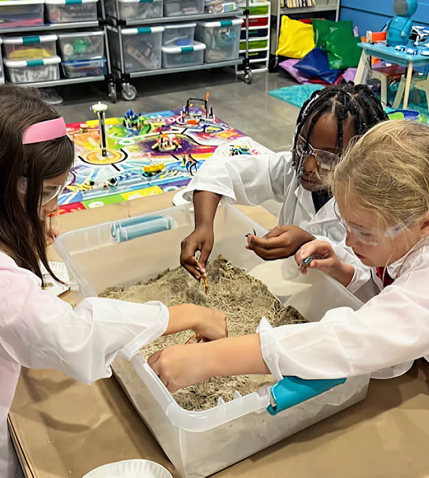 MCDS students participating in a hands-on sensory activity