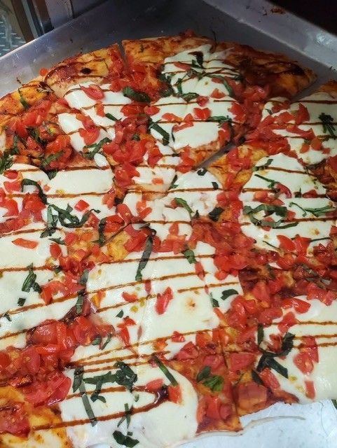 SAGE Dining Services pizza dish at MCDS