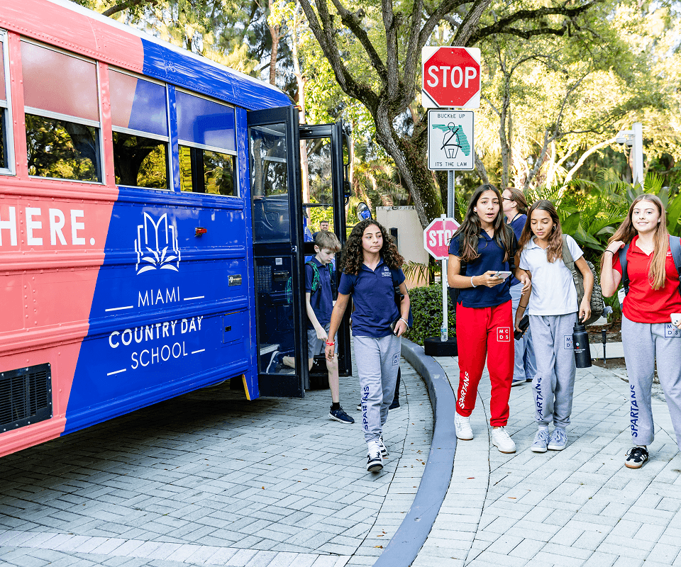 Spartan Bus with MCDS students boarding